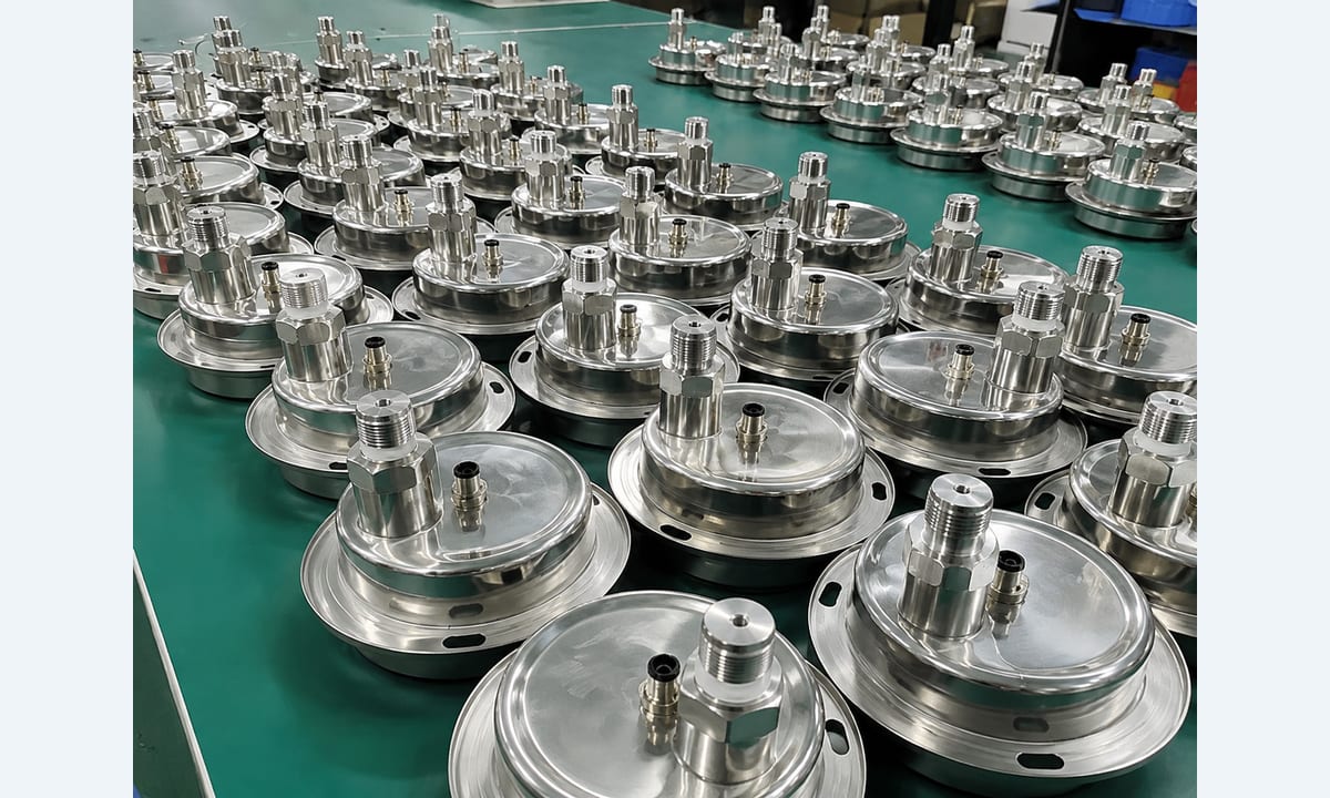 Finished pressure transmitter assemblies undergoing final inspection